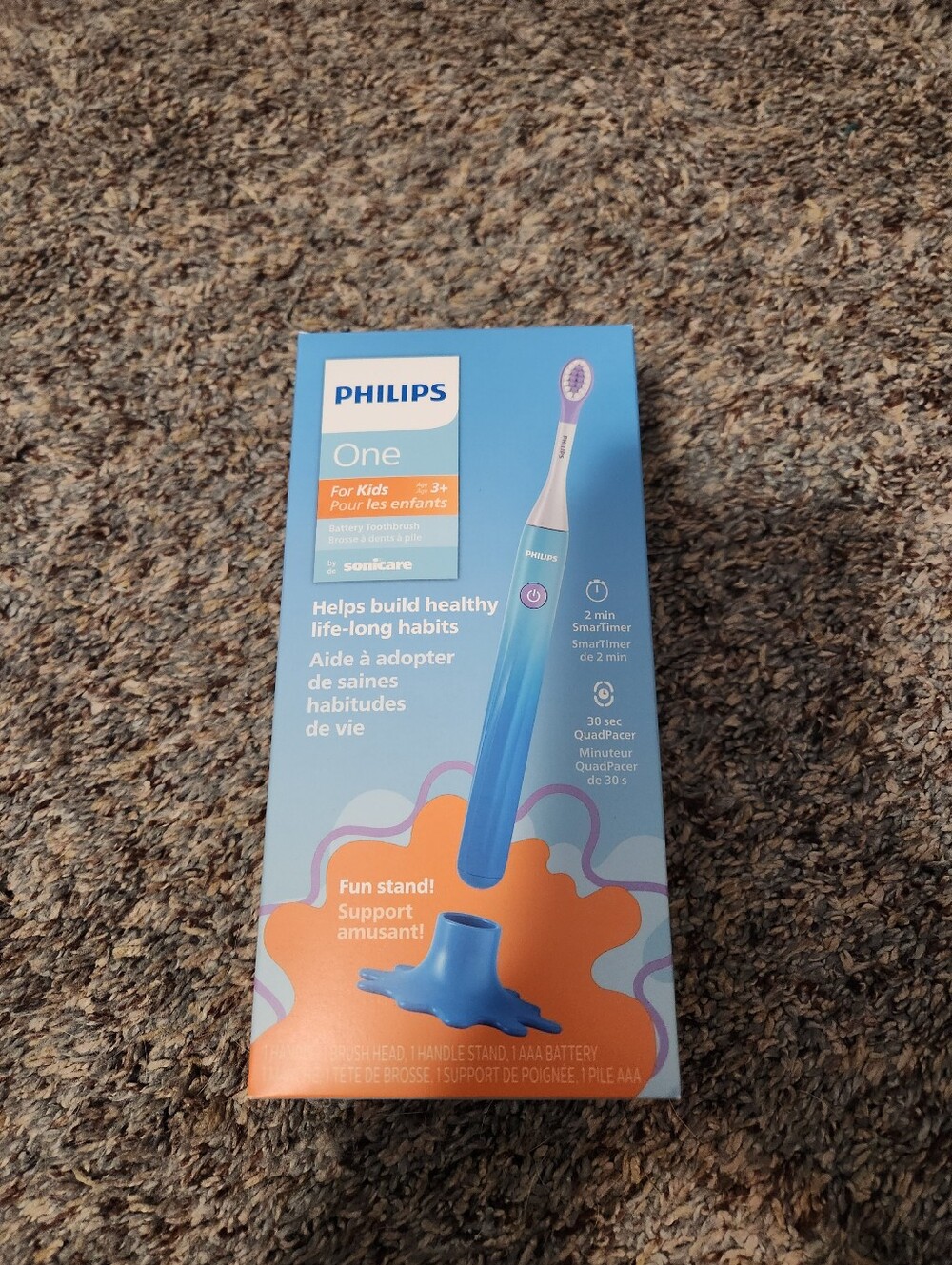 Philips One Kids Electric Toothbrush in Light Blue with Orange Stand
